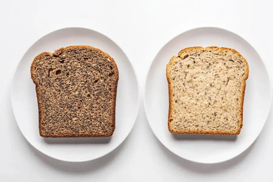 Comparison of banana bread and whole wheat bread slices with nutritional labels.